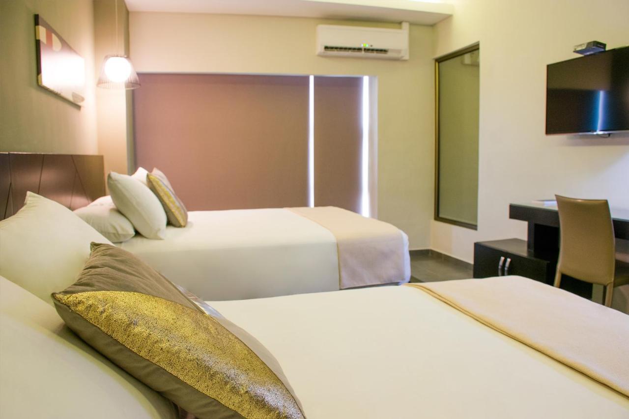 Remfort Hotel Santa Ana Esterno foto