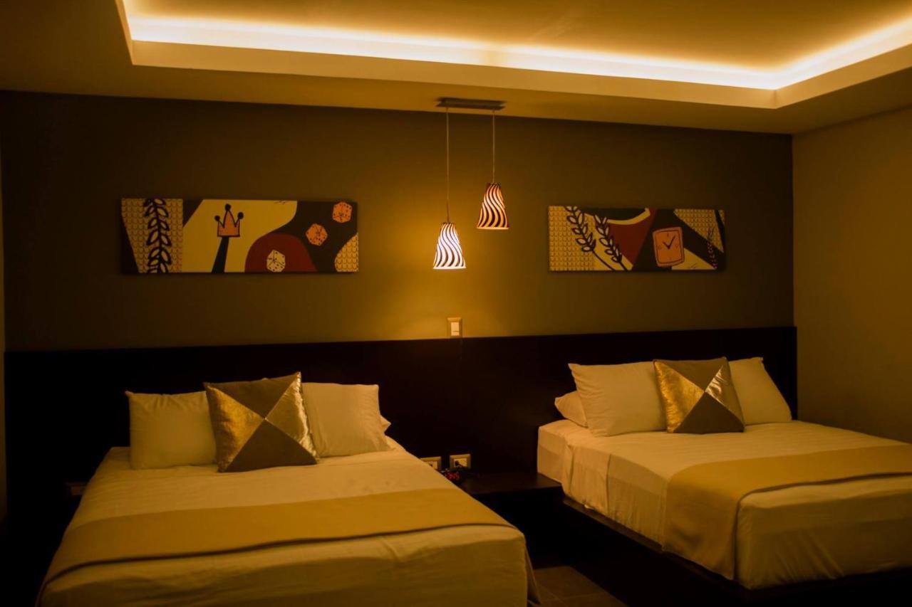 Remfort Hotel Santa Ana Esterno foto